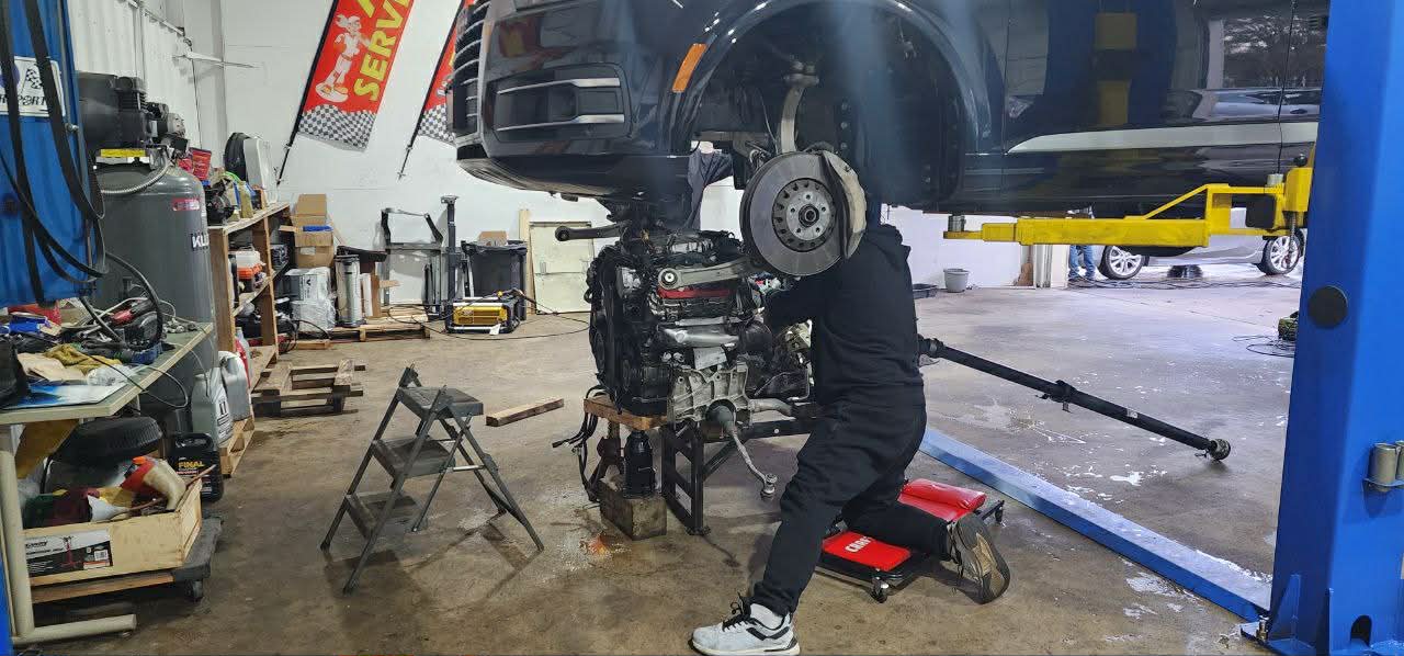 PEP Motor mechanic working on engine and transmission repair in Raleigh NC